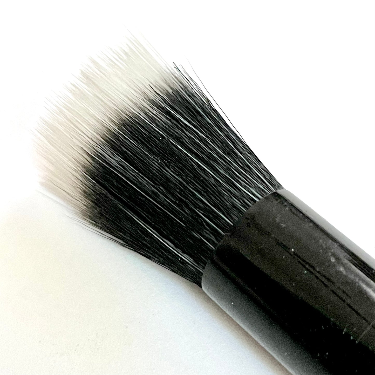 Side profile of Mini Soft Focus Duo Fiber Brush showing synthetic duo fiber bristles