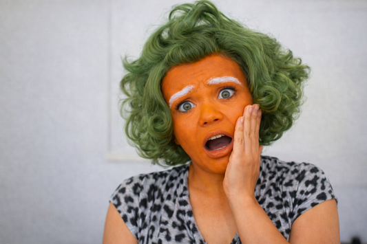 woman with orange oxidized foundation makeup looking shocked what to do when foundation turns orange mineral makeup tips